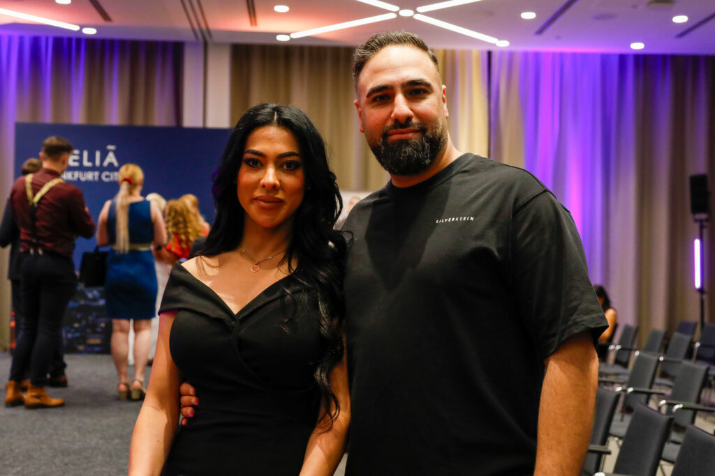 Sammy Taha mit Partnerin - Silverstein Label präsentierte sportliche Mode - Fashion Show Melia Frankfurt City Copyright: Marika Sturm